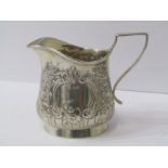 VICTORIAN SILVER CREAM JUG, oval base with foliate and floral embossed decoration, Birmingham