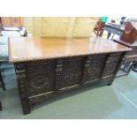 ANTIQUE CARVED OAK STORAGE CUPBOARD with twin central cupboard doors, matched with 2 side carved