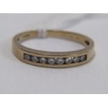 9ct YELLOW GOLD 8 STONE DIAMOND ETERNITY STYLE RING, channel set brilliant cut diamonds, good colour