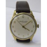 GENT'S GOLD CASED WRIST WATCH with leather strap, face marked Thomas Russelson, gold cased