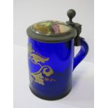 ANTIQUE GLASSWARE, Continental enamelled blue glass pewter lidded tankard, decorated with Huntsman