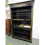 ROCHE BOIS, gilt ebonised open fronted adjustable bookcase, 138cm width