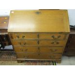 GEORGIAN DESIGN OAK BUREAU, fall front slope with 4 graduated long drawers and brass swan neck