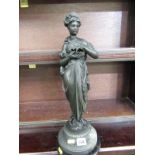 SCULPTURE, patinated metal circular base figure of Muse, 46cm height