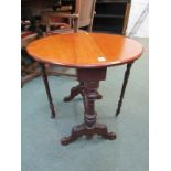 VICTORIAN WALNUT SUTHERLAND TABLE, ovel topped with carved twin cabriole legs