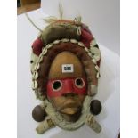 ETHNIC, African Dan shell decorated tribal mask, 46cm height