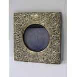 EDWARDIAN SILVER PHOTO FRAME, ornate scroll and floral embossed square frame with circular