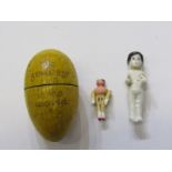 MINIATURE DOLLS, porcelain 2.5cm doll; together with miniature wooden doll in treen egg container