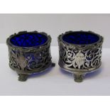 PAIR OF GEORGIAN DESIGN SILVER CIRCULAR SALTS, ornate fretwork design with blue glass liners, 97