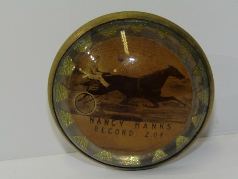 AMERICAN ANTIQUE FANCY BUCKLE, centre decorated "Nancy Hanks", trotting mare with cart, "Record 2.