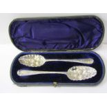 PAIR OF MID 18TH CENTURY SILVER SPOONS, later fruit embossed bowl and floral engraved handles with