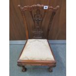 CHIPPENDALE DESIGN MINIATURE DINING CHAIR, ornate foliate carved and pierced back with drop-in seat
