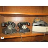 VINTAGE TELEPHONES, 2 black bakelite tabletop vintage telephones, together with box of spares