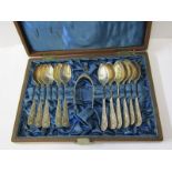 CASED SILVER TEA SPOONS, set of 11 ornate handled tea spoons, possibly Sheffield 1898, together with