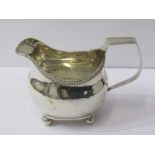 GEORGE III SILVER CREAM JUG, fluted rim with spherical feet, London 1814, 141 grams