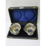 CASED PAIR OF SILVER SWEETMEAT DISHES, pair of pierced body swing handled sweetmeat dishes,