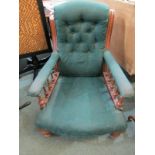 LATE VICTORIAN BUTTON BACK ARMCHAIR, green upholstered with spindle support arms