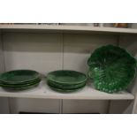 A quantity of Wedgwood Cabbage ware plates and a similar dish.