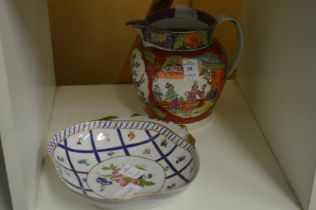 A porcelain jug and a shell shaped dish.