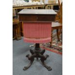 A 19th century rosewood pedestal sewing table, possibly Isle of Man, on carved cabriole legs with