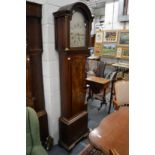 An 18th century mahogany longcase clock with eight day movement, the silvered arch dial signed Sam