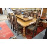 A set of six oak high back chairs with barley twist columns and legs.