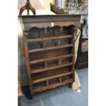 A continental walnut or fruitwood plate rack.
