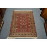 A small Bokhara style rug.