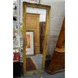 A gilt framed dressing mirror.