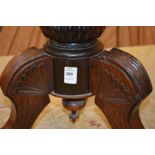 A Victorian rosewood revolving music seat.