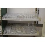 A quantity of cut glassware to include drinking glasses, decanters etc.