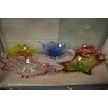 Five large colourful art glass dishes.