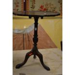 A Georgian style mahogany tilt top tripod table.