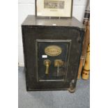 A small cast iron safe by E. Whitfield & Co, Birmingham.