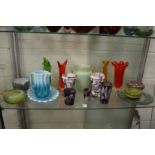 A good collection of colourful glassware to include Slag glass vases, opaque ribbed glass jug and