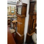 An oak longcase clock with thirty hour movement, the painted square dial signed Charles Haines,