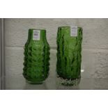 Two Whitefriars green glass vases, a pineapple vase and a bark vase.