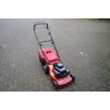 A Mountfield petrol rotary lawn mower.