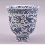 A CHINESE BLUE AND WHITE PORCELAIN PEDESTAL CUP, painted with cranes and horses, six character