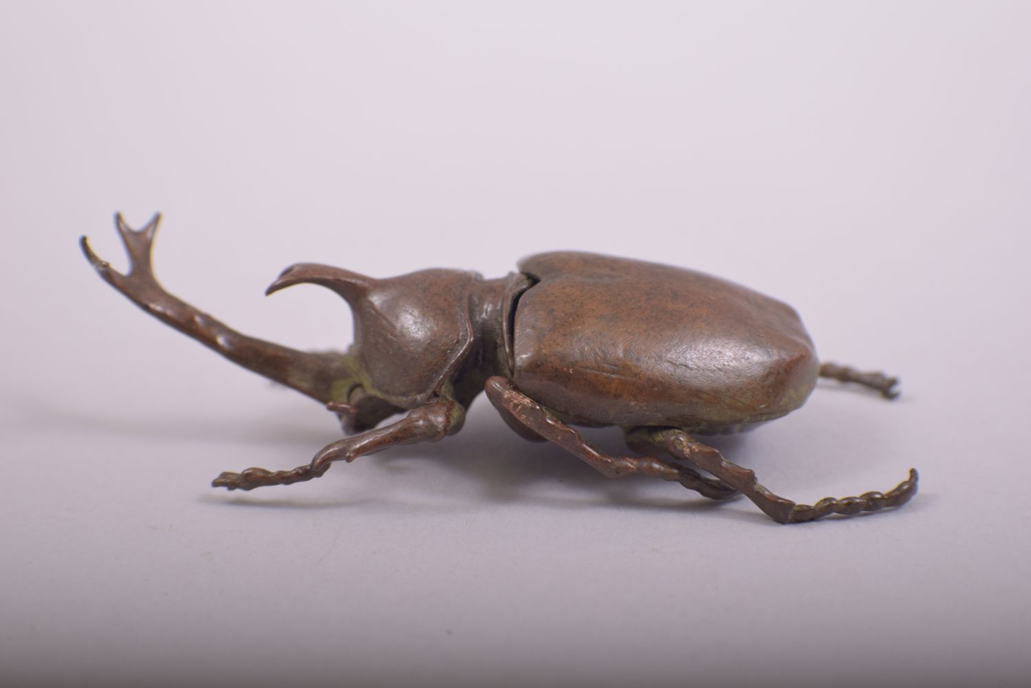 A JAPANESE BRONZE MODEL OF BEETLE; rhinoceros beetle, with an opening hinged back section, 10cm - Image 2 of 7