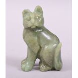 A CHINESE GREEN HARDSTONE / JADEITE FIGURE OF A CAT, 6.5cm high.