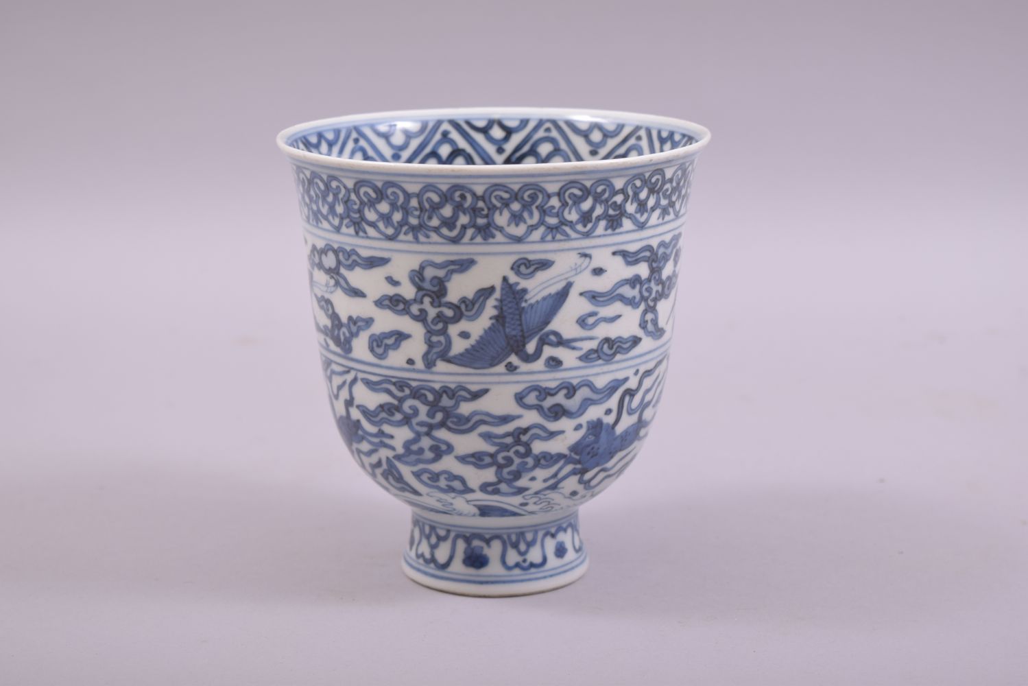 A CHINESE BLUE AND WHITE PORCELAIN PEDESTAL CUP, painted with cranes and horses, six character - Image 2 of 7