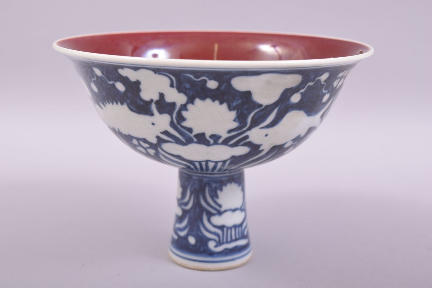 A CHINESE BLUE AND WHITE PORCELAIN STEM CUP, the exterior decorated with fish and flora, the - Image 4 of 6
