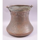 A LARGE LATE SAFAVID PERSIAN IRAN COPPER TINTED BUCKET, the body engraved and chased with integrated