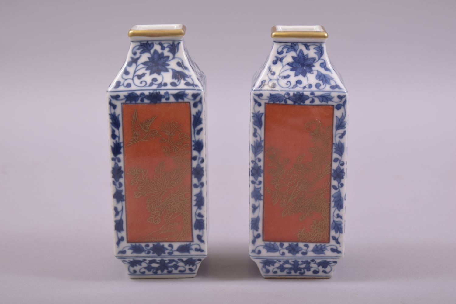 A PAIR OF SMALL CHINESE BLUE, WHITE AND CORAL RED SQUARE FORM VASES, each side with a panel of - Image 2 of 6