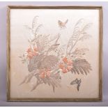 A CHINESE SILK WORK EMBROIDERD PICTURE depicting birds and butterflies amongst flora, 53cm x 53cm.
