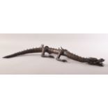 A SUPERB JAPANESE BOXWOOD RETICULATED MODEL OF A DRAGON, standing on four carved legs with a