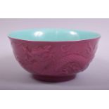 A GOOD CHINESE PINK AND TURQUOISE GLAZED PORCELAIN BOWL, the exterior with raised decoration of