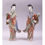 A PAIR OF JAPANESE PORCELAIN FIGURES of geishas, each wearing well modelled and painted robes,