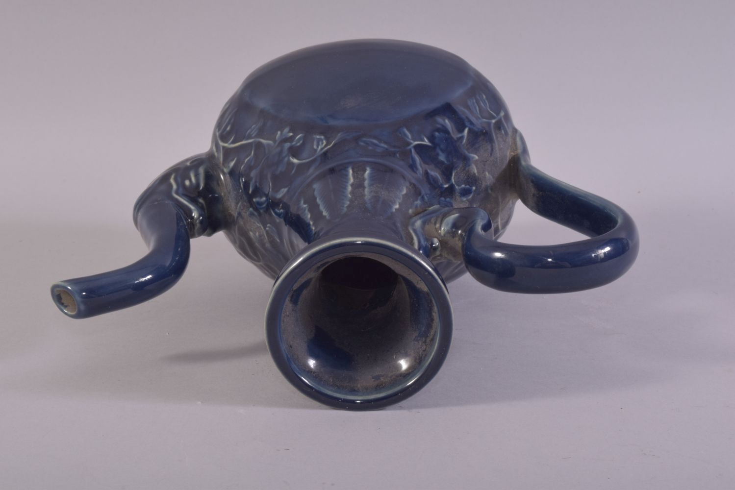 A CHINESE POWDER BLUE GLAZE WINE EWER, decorated with scrolling vines, (af), 24.5cm high. - Image 5 of 6